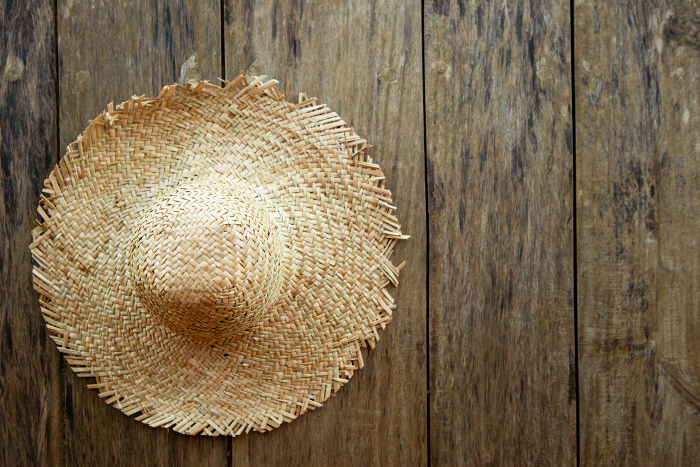 Straw hat and wood grain copy space Summer/vacation image