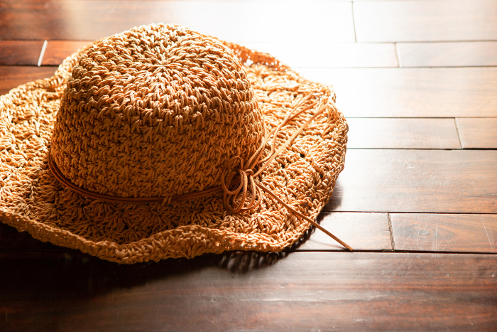 Straw hat and wood grain copy space Summer/vacation image