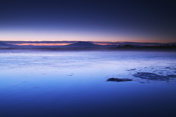 Shari dake in the morning at Lake Toto boto, Hokkaido, Japan  19 C