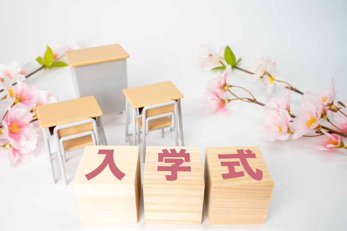 Cherry blossoms, school desks and the words 
