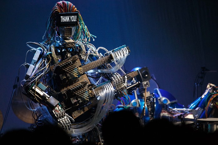 Robot Band s First Live Performance Superhuman performance  June 24, 2013, Tokyo, Japan   Robot band Z Machines perform on stage during a special live performance at Liquidroom in downtown Tokyo. The guitarist  Mach  can slide, shred and mute as he is also equipped with a body and soul system that allows him to head bang. The drummer  Ashura  consists of 4 snare drums, 2 crash cymbals and 3 bass drums while the keyboardist  Cosmo  is equipped with a unique eye beam function.  Photo by Christopher Jue Nippon News 