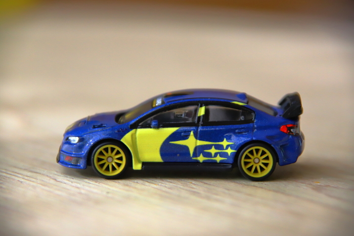 1 blue miniature car