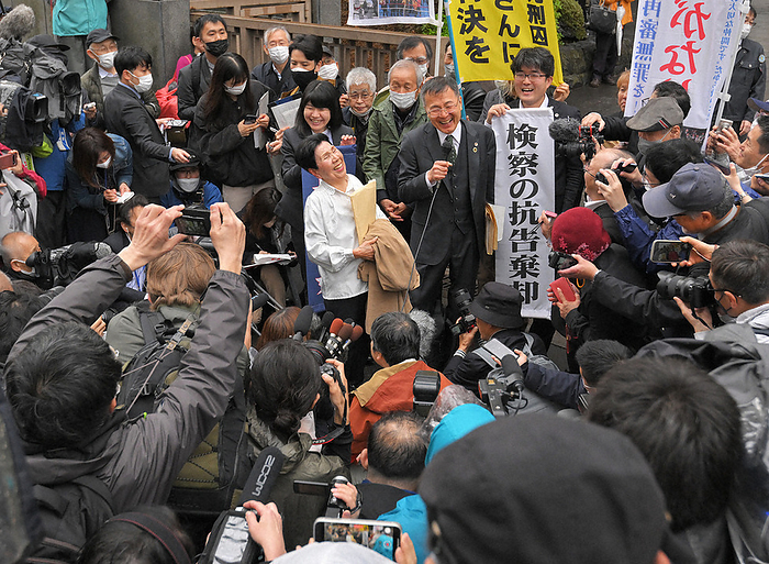 Hakamada case, Tokyo High Court grants commencement of retrial. Hideko Hakamada  center , sister of former Hakamada Iwao Hakamada, smiles in front of supporters and the press after the High Court ruled to  initiate a retrial  in the Hakamada case.