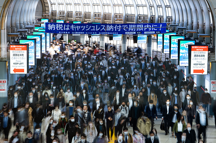 The Government of Japan changes mask s rule Pedestrians walk at a concourse of Shinagawa Station in Tokyo, Japan on March 15, 2023. The Government of Japan started leaving the decision on masking up to individuals from March 13, 2023, regarding the wearing of masks against COVID 19 infection.  Photo by AFLO 