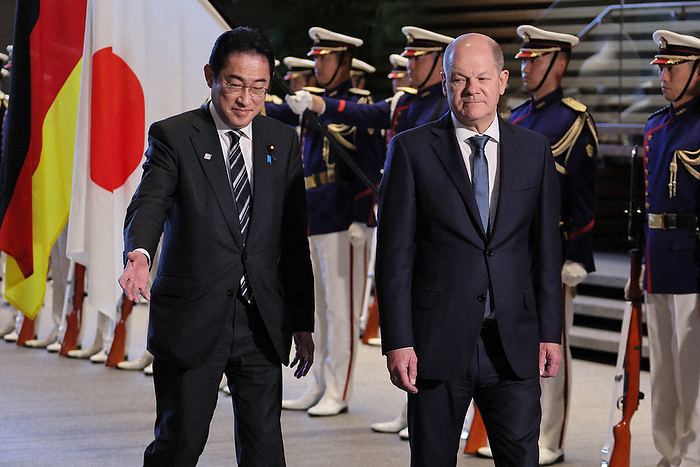 German Chancellor Visits Japan German Chancellor Olaf Scholz  right  receives a ceremonial salute by a guard of honor after a summit meeting with Prime Minister Fumio Kishida  left  at the Chancellery on March 18, 2023, 4:31 p.m. Photo by Taisuke Wada