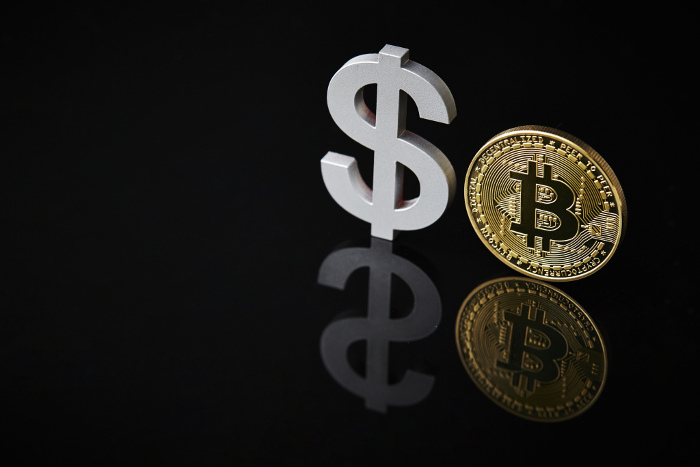 Bitcoin and U.S. Dollar Currency Symbols