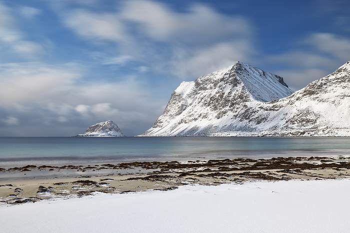 Lofoten Islands a long exposure to capture the afternoon light at Haukland beach during an winter day, Vestvagoy, Lofoten island, Norway, Europe. Photo by: Carlo Conti