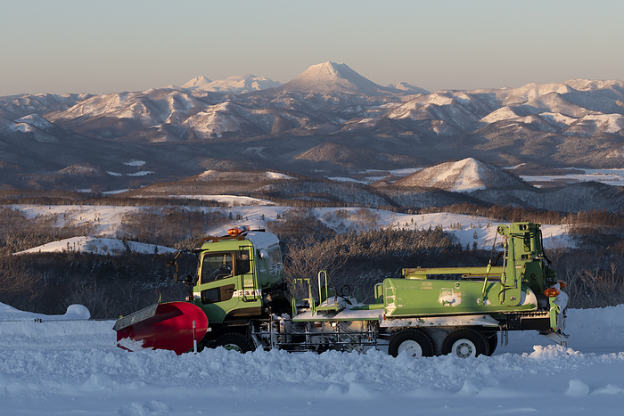 Mountains of Akan in the morning sun, Hokkaido, Japan Snow plows, Teshikaga Town, Hokkaido, Japan This photo was taken at the first observatory of Lake Mashu in Teshikaga Town, Hokkaido. The highest peak is Mt. Male Akan, and to its left are Mt.