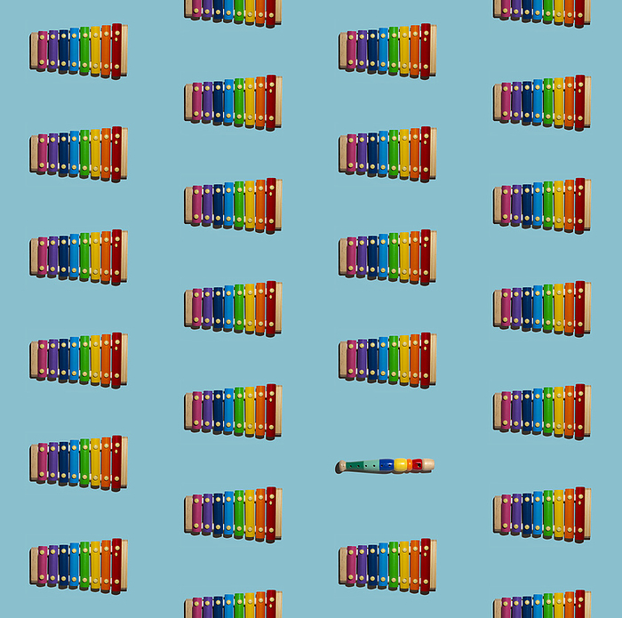 Pattern of colorful xylophones with single flute