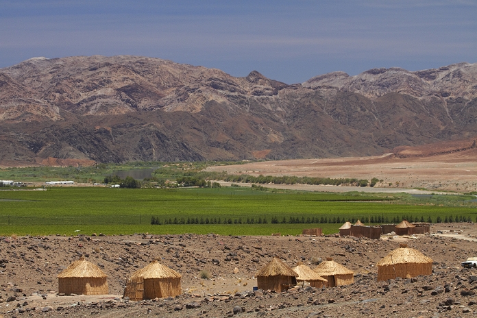 Namibia Settlements Straw huts, Aussenkehr vineyards, Norotshama River Resort, Orange River and South Africa,  viewed from Aussenkehr Nature Park, Southern Namibia, Africa