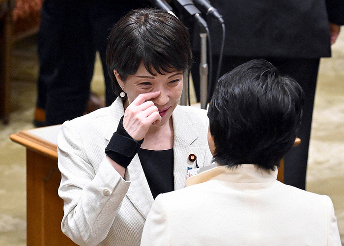 Budget Committee of the upper house of the Diet  one half of the yosaniinkai  Sanae Takaichi, Minister of State for Economic and Security Affairs, exchanges words with her colleagues after a meeting of the Budget Committee of the House of Councillors, at 0:43 p.m. on March 28, 2023, in the Diet.