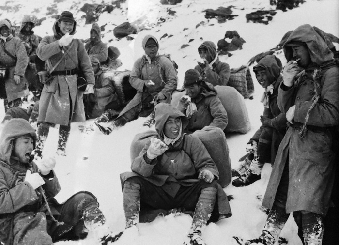  Pacific War . Japanese soldiers taking a rest during a march across the snowfield at Horotairi Island in the Northern Kuril Islands  October 1944, photo by Suzuki . On the bag containing the negatives of this photo, the date  November 3, 1944  when the Mainichi Shimbun Osaka Photo Department received the negatives from the site, the stamp  Censored by the Ministry of the Army  and a note in red  Censored by the Northern Army  are stamped. Mainichi Legacy Photo Archives Project. Digitized wartime negatives, dry plates, photographic prints, etc.