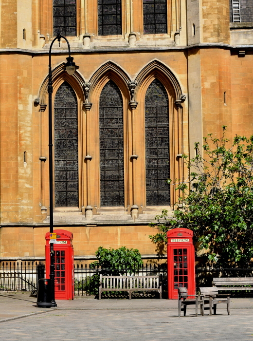 Old streets and telephone booths in London, England