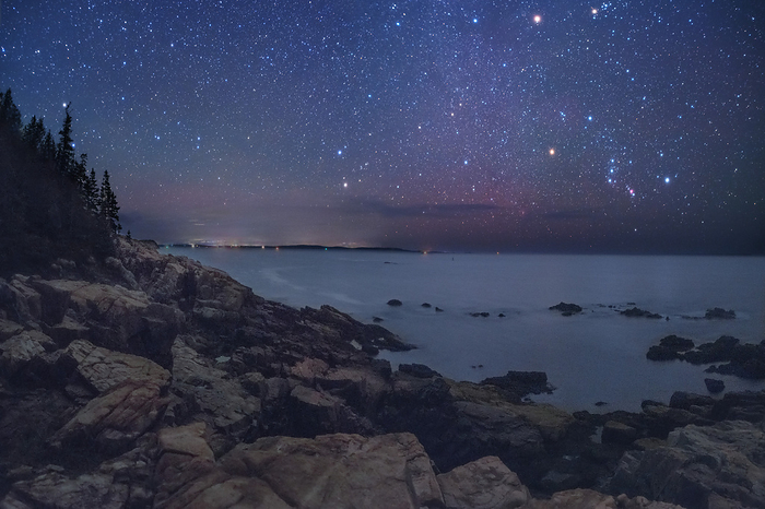 Night sky over Acadia National Park, Maine, USA Night sky over Otter Cliffs, Acadia National Park, Maine, USA. The Orion constellation is at right and the Gemini constellation is at centre., by WALTER PACHOLKA, ASTROPICS SCIENCE PHOTO LIBRARY