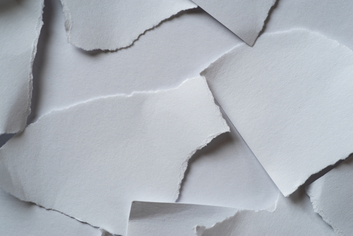 Torn white paper