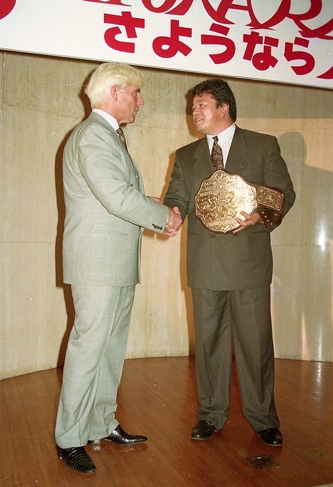 1991 New Japan Pro Wrestling Tatsumi Fujinami wins NWA title 19910321, New Japan Pro Wrestling, Tatsumi Fujinami receives congratulations from former champion Ric Flair  left  after winning the NWA World Heavyweight Title, Tokyo Dome Launch Party, TSK CCC Hall, Roppongi, Minato ku, Tokyo.