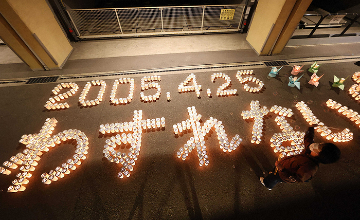 Soon 18 years have passed since the JR Fukuchiyama Line derailment accident. Candles lit at the site of the train derailment to preserve the lessons learned from the accident, 7:36 p.m. April 24, 2023, in Amagasaki, Hyogo Prefecture.