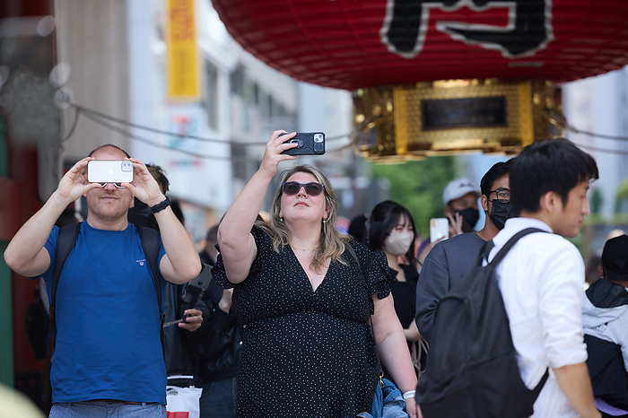 2023 Golden Week New Corona waterfront measures lifted Foreign tourists take pictures at Nakamise shopping street, an approach to the Sensoji temple in Asakusa entertainment district, Tokyo in Japan on May 1, 2023.  Yohei Osada AFLO 