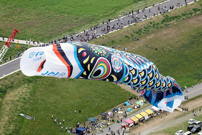 Boy s Day festival will soon be upon us A  jumbo carp streamer  is lifted by crane and swims in the sky in Kazo City, Saitama Prefecture at 11:38 a.m. on May 3, 2023.