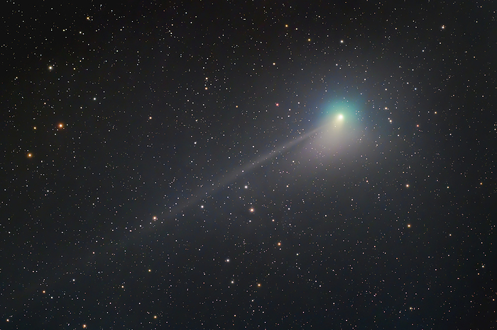 Comet 2022 E3  ZTF  Comet C 2022 E3  ZTF  as it passed the Earth on the 12th January 2023. Discovered on the 2nd March 2022, C 2022 E3  ZTF  is a long period comet originating from the Oort cloud, which is approximately 149 billion kilometres away from our Sun. The comet gets its characteristic green glow from the ejection of diatomic carbon and cyanogen from its nucleus to the coma  atmosphere  as it is heated by the Sun. The comet possesses an ion tail, which occurs as a result of gas ionised by ultraviolet radiation, causing it to glow. Photographed from the Dark Sky Alqueva Observatory, Portugal, between the constellations of Hercules, Corona Borealis and Bootes., by MIGUEL CLARO SCIENCE PHOTO LIBRARY
