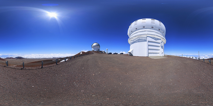 Gemini North and CFHT observatories, Mauna Kea, Hawaii Gemini North telescope  left  and Canada France Hawaii Telescope, Mauna Kea, Hawai i, panoramic photograph. These two observatories are part of a group of 13 independent large telescopes that are based at the summit of Mauna Kea., by NOIRLab AURA NSF PETR HORALEK SCIENCE PHOTO LIBRARY