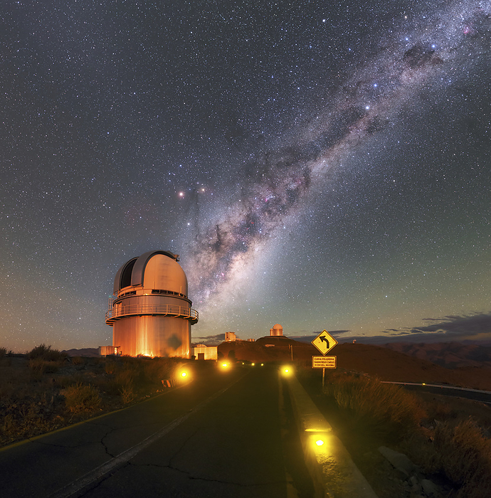 Danish 1.54 metre telescope at night, Chile Danish 1.54 metre telescope at night, La Silla Observatory in the Chilean Atacama Desert. The on ground lighting is there to guide cars, which are prohibited from using headlights, to the site. In the sky, to the left, almost hidden behind the telescope, is the faint green glow of Comet 252P LINEAR and, overhead, the tail of Scorpius curves into the glowing clouds of the Milky Way, keeping close company to Mars and Saturn. Further up the bright galactic band are triple star systems Alpha and Beta Centauri. At the very top right is the Southern Cross., by ESO PETR HORALEK SCIENCE PHOTO LIBRARY