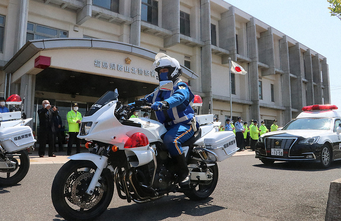 A police vehicle is seen off by officials as it heads out on patrol after the mobilization ceremony held the day before the Spring National Traffic Safety Campaign. A police vehicle is seen off by officials as it heads out on patrol after the mobilization ceremony held the day before the Spring National Traffic Safety Campaign at the Koriyama North Police Station on May 10, 2023.