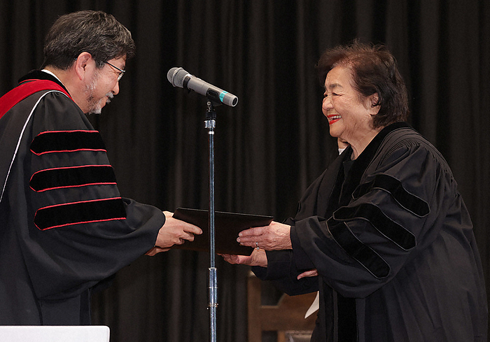 Setsuko Thurlow receives an honorary doctorate to speak at her alma mater. Setsuko Thurlow  right  receives an honorary doctor of literature degree at Hiroshima Jogakuin University in Higashi Ward, Hiroshima, at 1:22 p.m. on May 15, 2023  photo by Takeshi Nishimura .