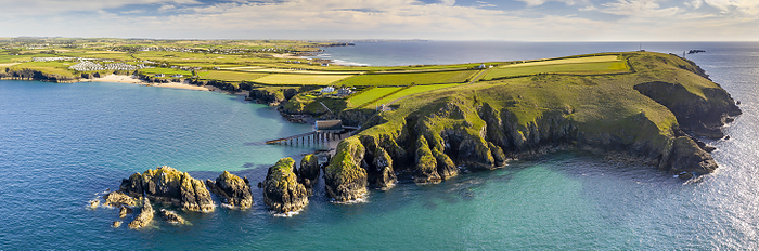 Aerial vista of Trevose Head, Padstow Lifeboat Station and Mother Iveys Bay, North Cornwall, England. Summer  July  2020. Aerial vista of Trevose Head, Padstow Lifeboat Station and Mother Iveys Bay, North Cornwall, England, United Kingdom, Europe, by Adam Burton