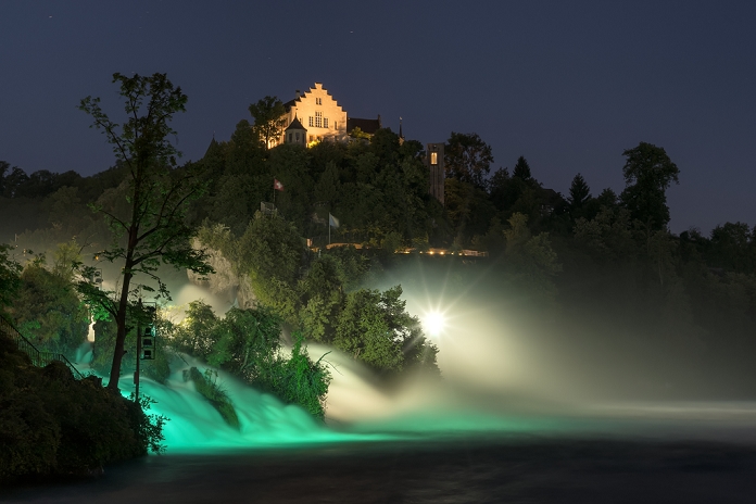 Switzerland, Schaffhausen, View of Rhine Falls with Laufen Castle at night