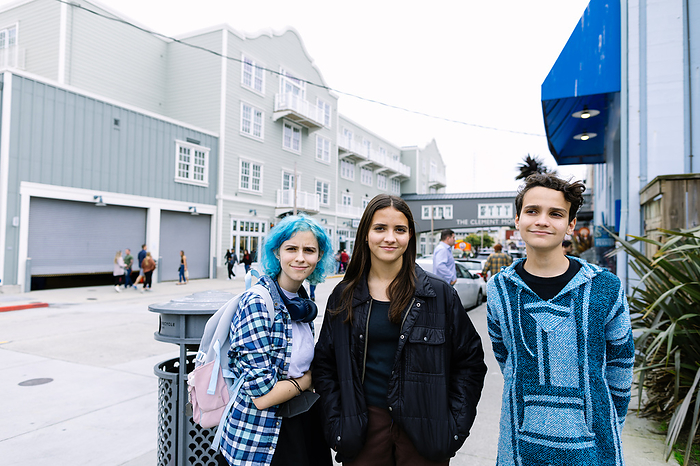 Teen Siblings Stand On Cannery Row In Monterey California