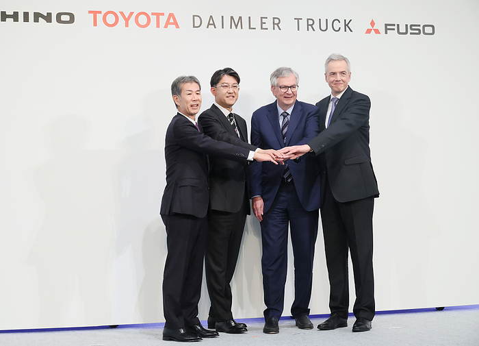 Toyota and Daimler Truck will form a holding company as Hino and MFTBC will merge their businesses May 30, 2023, Tokyo, Japan    L R  Japan s Hino Motors CEO Satoshi Ogiso, Toyota Motor CEO Koji Sato, Germany s Daimler Truck CEO Martin Daum and Daimler s subsidiary MFTBC  Mitsubishi Fuso  CEO Karl Depper join their hands as they announced Hino and MFTBC will merge their businesses and Toyota and Daimler Truck will form a holding company at a press conference in Tokyo on Tuesday, May 30, 2023.      photo by Yoshio Tsunoda AFLO 