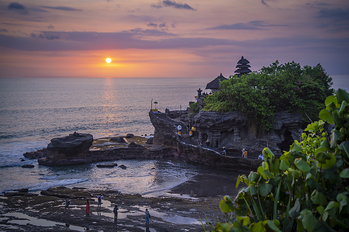 View of Tanah Lot, traditional Balinese temple at sunset, Beraban, Kediri, Tabanan Regency, Bali, Indonesia, South East Asia, Asia View of Tanah Lot, traditional Balinese temple at sunset, Beraban, Kediri, Tabanan Regency, Bali, Indonesia, South East Asia, Asia, by Frank Fell