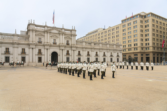 Policemen performing changing of guards ceremony in front of La Moneda Palace, Santiago, Santiago Metropolitan Region, Chile Policemen performing changing of guards ceremony in front of La Moneda Palace, Santiago, Santiago Metropolitan Region, Chile, South America, by Jan Miracky