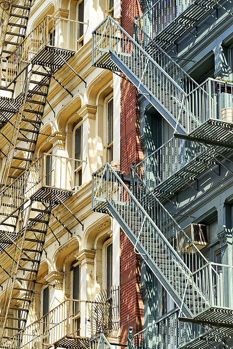 New York. Manhattan. United States. Fire escapes stairs New York. Manhattan. United States. Fire escapes stairs, by Zoonar Marco Brivio