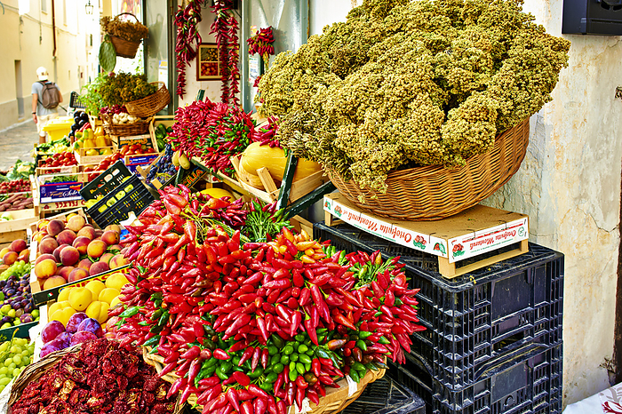 Salento. Apulia Puglia Italy. Gallipoli. Dried red chili and fruit Salento. Apulia Puglia Italy. Gallipoli. Dried red chili and fruit, by Zoonar Marco Brivio