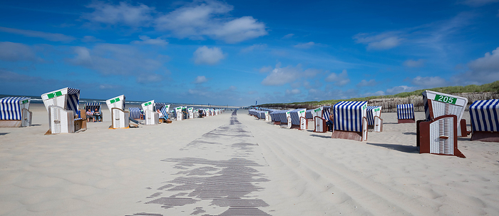 Beach chairs on Norderney Island, Germany Beach chairs on Norderney Island, Germany, by Zoonar Matthias Scho