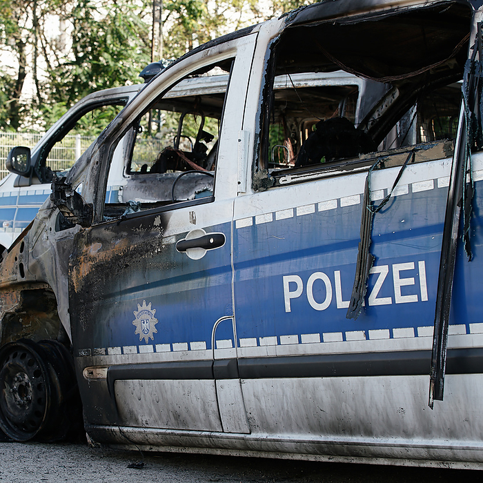 Burnt out cars after an arson attack on police cars in the center of Magdeburg. Burnt out cars after an arson attack on police cars in the center of Magdeburg., by Zoonar Heiko Kueverl