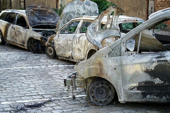 Burnt out cars after an arson attack in the center of Magdeburg Burnt out cars after an arson attack in the center of Magdeburg, by Zoonar Heiko Kueverl