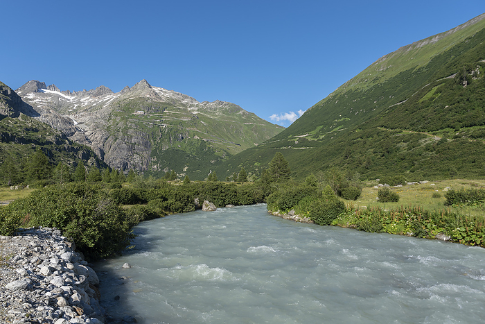 Switzerland Valley near the hamlet of Gletsch with the Rhone River in front of the Rhone Glacier, by Zoonar J rgen Wacke