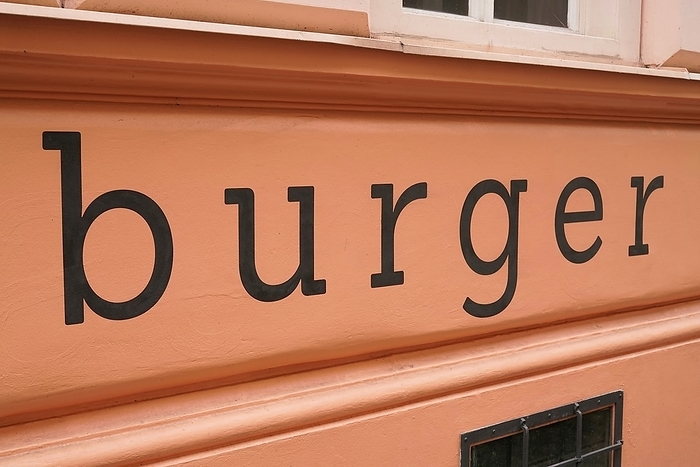 Facade of a burger restaurant in the old town of Prague Facade of a burger restaurant in the old town of Prague, by Zoonar Heiko Kueverl