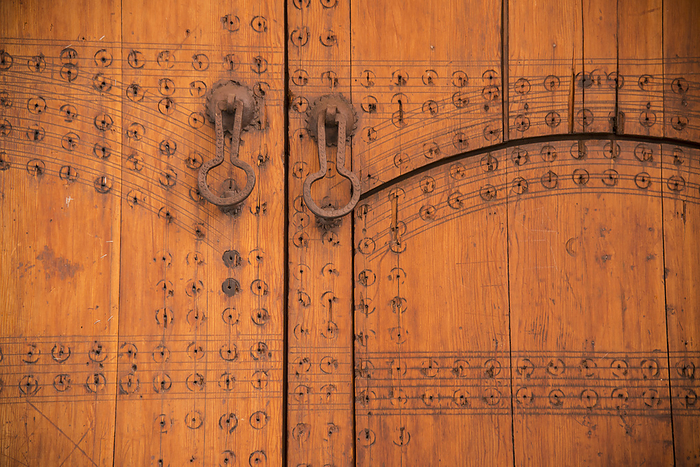 Marrakech, Morocco Close up detail of an ornate door and metal handles in Marrakech, Morocco  Marrakech, Morocco, by Michael Melford   Design Pics