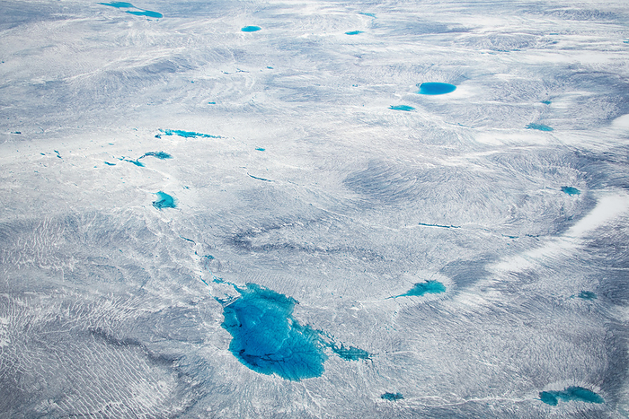 Greenland Aerial view of Greenland ice sheet and blue lakes  Ilulissat, Greenland, by Michael Melford   Design Pics