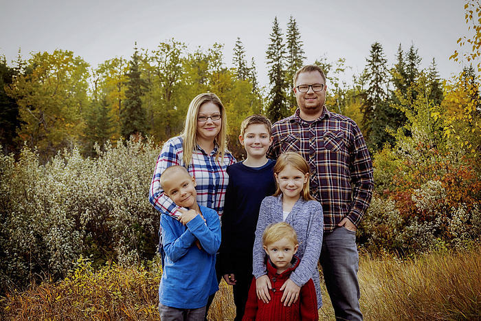 Portrait of a family of six in a park in autumn; Edmonton, Alberta, Canada, by LJM Photo / Design Pics
