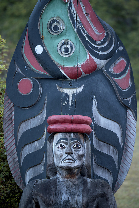 Canada Totem pole in a cemetery on Cormorant Island near Vancouver Island, Haida Gwaii, BC, Canada  Cormorant Island, Haida Gwaii, British Columbia, Canada, by Michael Melford   Design Pics