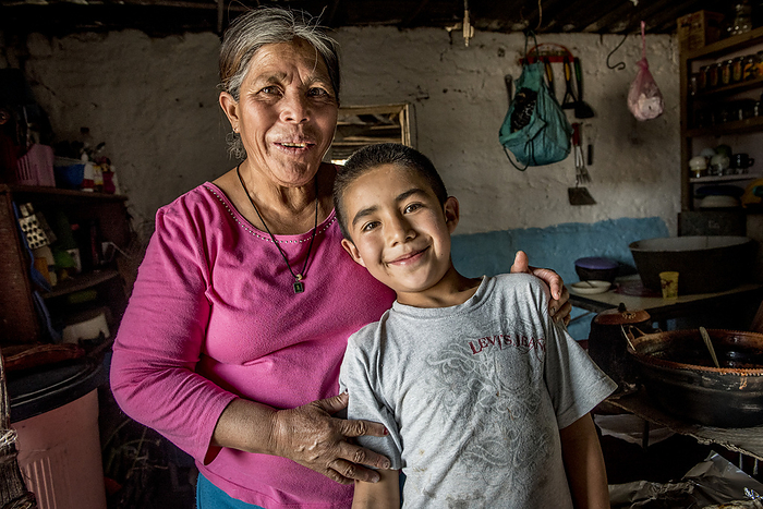 Portrait of a senior woman with a boy in a home in Mexico; Ejido Hidalgo, San Luis, Mexico, by Karen Kasmauski / Design Pics
