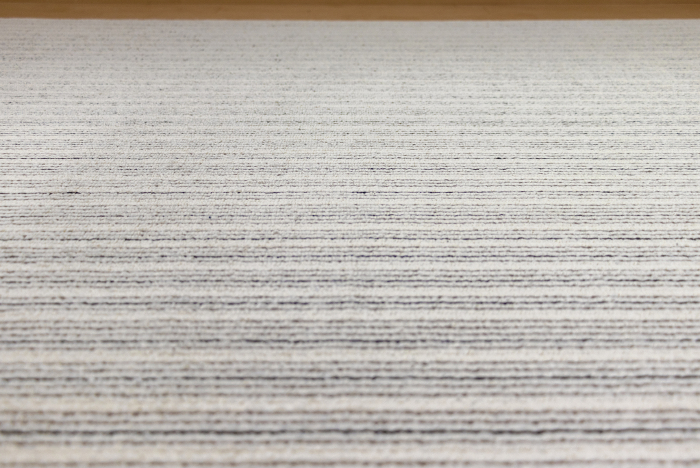 Striped carpet surface