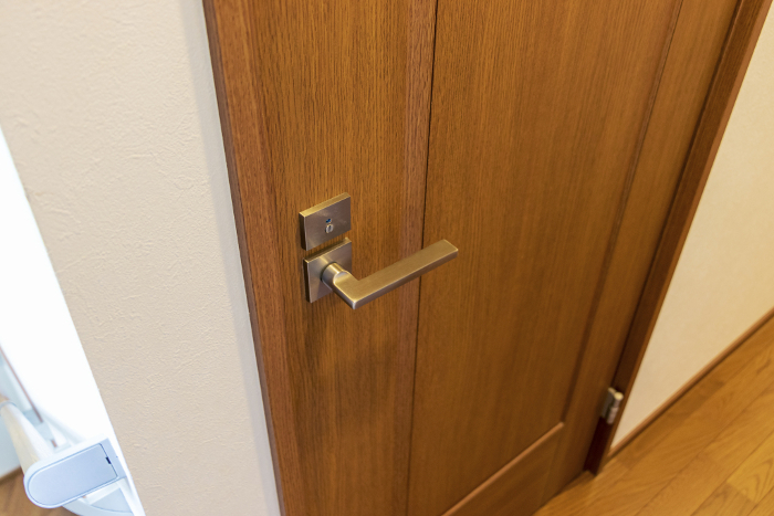 Wooden door with metal knob