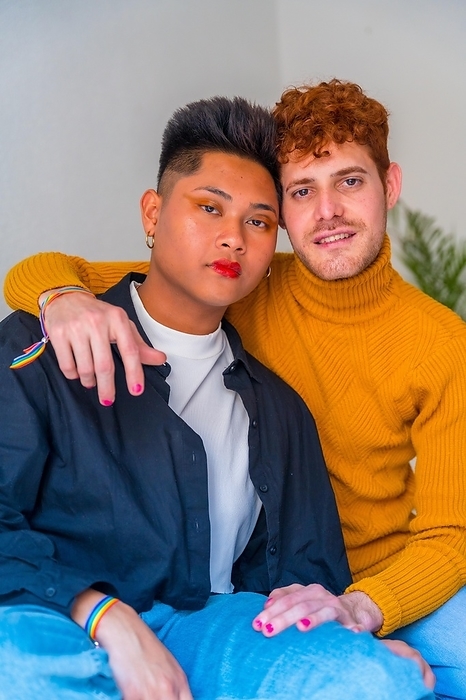 Portrait of beautiful gay couple in makeup, smiling indoors at home, lgbt concept, by Unai Huizi