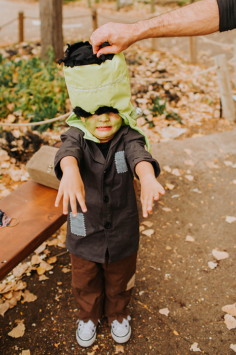 Young multiracial Asian boy dressed as Frankenstein for Hallowee